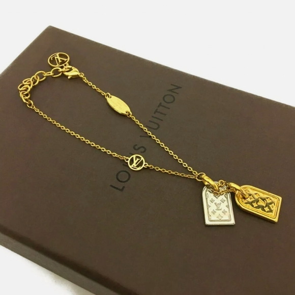 LOUIS VUITTON NANOGRAM LV CIRCLE GOLD TONE BRACELET/P1487 - Picture 1 of 16